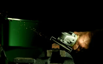Stock Video Grinder Tool Creating Sparks In The Darkroom For PC