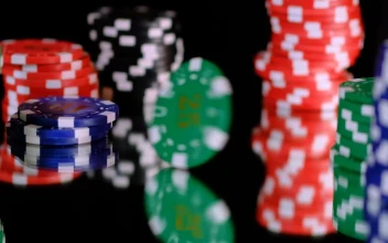 Stock Video Green Poker Chip Spinning Between More Chips For PC
