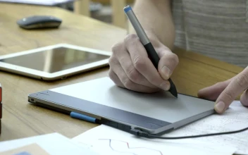 Stock Video Graphic Designer Working With A Graphic Tablet For PC