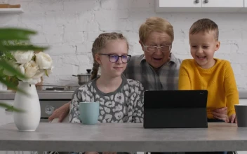 Stock Video Grandmother Enjoying A Video With Her Family For PC
