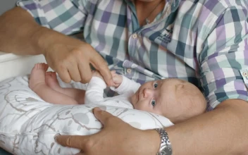 Stock Video Grandfather Holding A Baby For PC