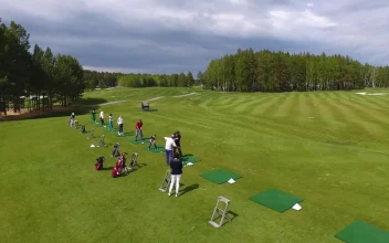 Stock Video Golfers In A Line For PC