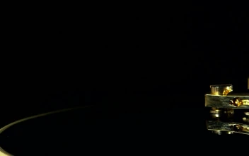 Stock Video Golden Guitar Strings Against A Dark Room For PC