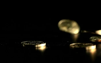 Stock Video Gold Coins On A Table For PC