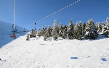 Stock Video Going Up The Snowy Mountain In A Ski Resort For PC