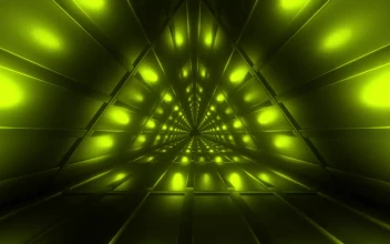 Stock Video Going Through A Triangular Tunnel Lit Up In Green For PC
