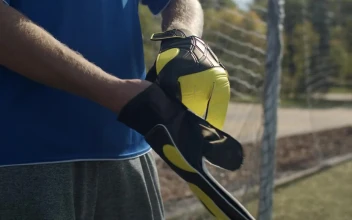 Stock Video Goalkeeper Putting On His Gloves For PC
