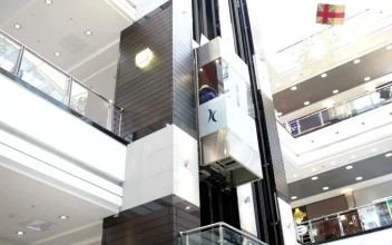 Stock Video Glass Elevator Inside A Shopping Centre For PC