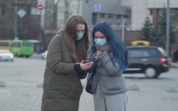 Stock Video Girls With Masks Informing About The Coronavirus For PC