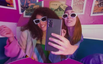 Stock Video Girls Taking Selfies In A Retro Restaurant For PC