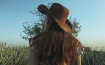 Stock Video Girl With Mexican Style Walking Through A Ranch For PC