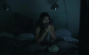 Stock Video Girl Watching A Horror Movie In Her Bedroom With The For PC