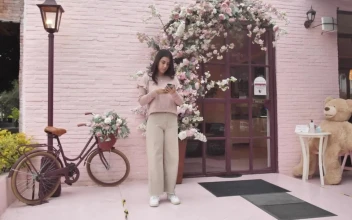 Stock Video Girl Waiting For Her Date In A Cottage Style Place For PC