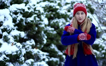 Stock Video Girl Trying To Warm Up In The Winter For PC