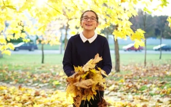 Stock Video Girl Throwing Autumn Leaves For PC