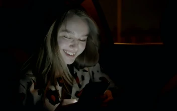 Stock Video Girl Texting In The Back Seat Of A Car For PC