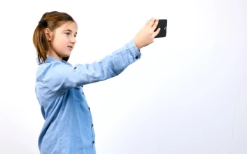 Stock Video Girl Taking Selfies With Her Cell Phone For PC
