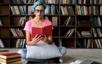 Stock Video Girl Studying A Book She Starts To Fall Asleep For PC