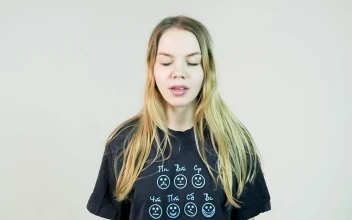 Stock Video Girl Sneezing And Covering Her Nose For PC