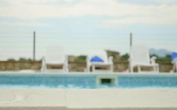 Stock Video Girl Smiling While In The Pool Portrait For PC