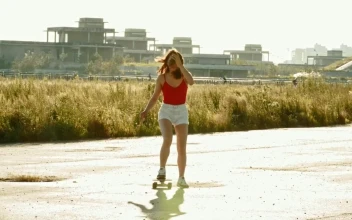 Stock Video Girl Skating Outside On A Sunny Afternoon For PC