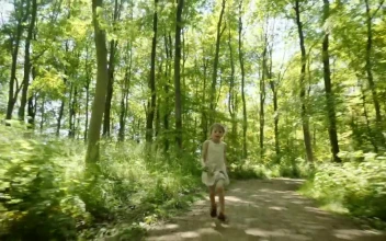 Stock Video Girl Running Through Woodland For PC