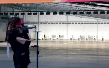 Stock Video Girl Practicing Target Shooting With A Gun For PC
