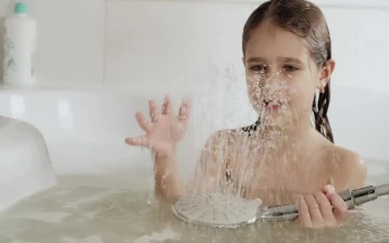 Stock Video Girl Playing With Water While Taking A Bath For PC