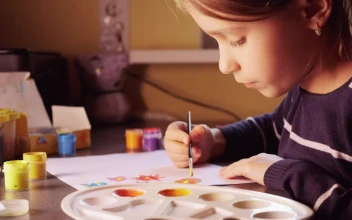 Stock Video Girl Painting With Watercolors At Home For PC