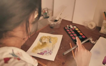 Stock Video Girl Painting A Picture In Watercolor During Video Call For PC