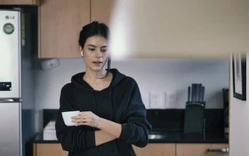 Stock Video Girl On A Call While Drinking A Cup Of Coffee For PC