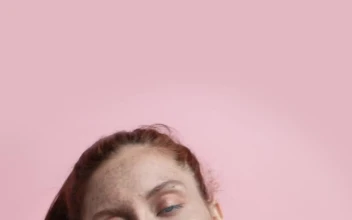 Stock Video Girl Modeling Captivatingly On A Pink Background For PC