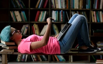 Stock Video Girl Laying Down With Her Laptop For PC