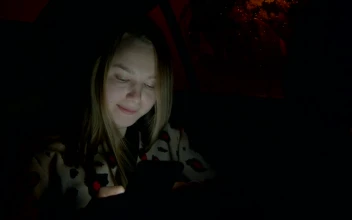 Stock Video Girl In The Back Seat Of A Car Texting For PC