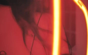 Stock Video Girl In Neon Sign For PC