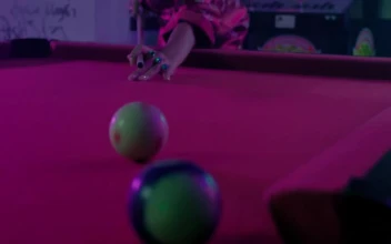 Stock Video Girl In A Japanese Style Dress Playing Pool For PC
