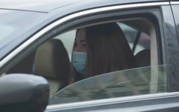 Stock Video Girl In A Car Coughing With Face Mask For PC