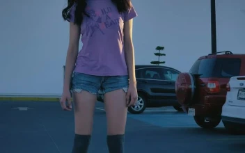 Stock Video Girl Gently Skating In A Parking Lot For PC