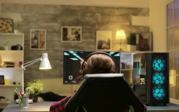 Stock Video Girl Gamer Celebrates Win In Home Office Screen View For PC