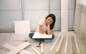 Stock Video Girl Frustrated When Assembling A Furniture For PC