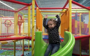 Stock Video Girl Enjoying A Day At A Play Park For PC