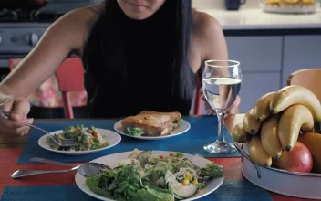 Stock Video Girl Eating Salad In Her Kitchen Dining Room For PC