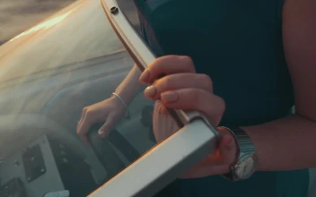 Stock Video Girl Driving A Small Boat For PC