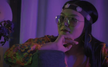 Stock Video Girl Dressed As A Hippie At A Costume Party For PC