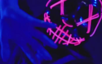 Stock Video Girl Dancing With A Mask In Front Of The Lens For PC