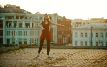 Stock Video Girl Dancing Ballet On Top Of A Building For PC