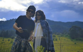 Stock Video Girl And Boy Taking A Selfie On A Natural Landscape For PC