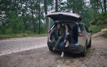 Stock Video Girl And Boy Enjoying Nature During A Road Trip For PC
