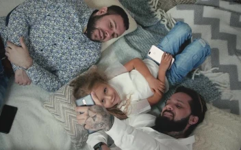 Stock Video Gay Couple Taking Selfies With Daughter For PC
