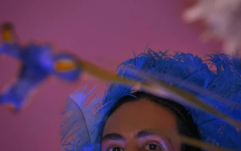 Stock Video Gay Boy With Colorful And Extravagant Makeup And Dress For PC